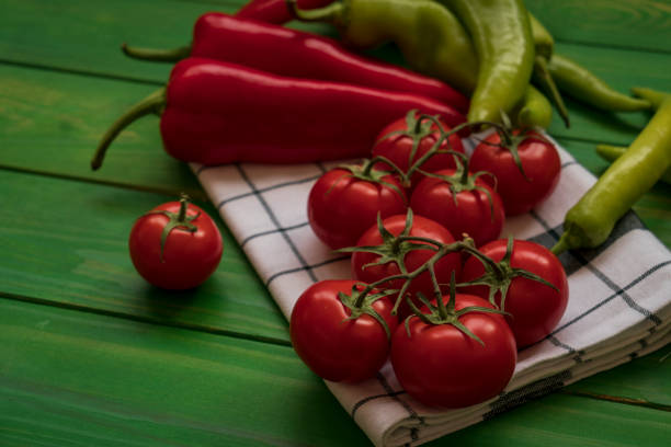 Tomatoes and peppers on a linen napkin