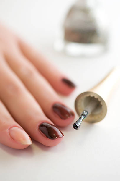 istock female hand with a manicure close up 137933953