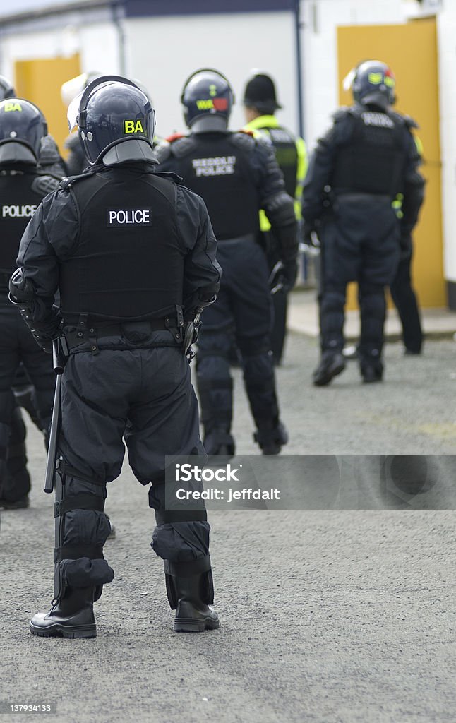 Reino Unido agentes da polícia em Riot equipamento - Foto de stock de Protesto royalty-free