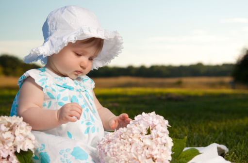 Portrait - Cute baby girl on meadow