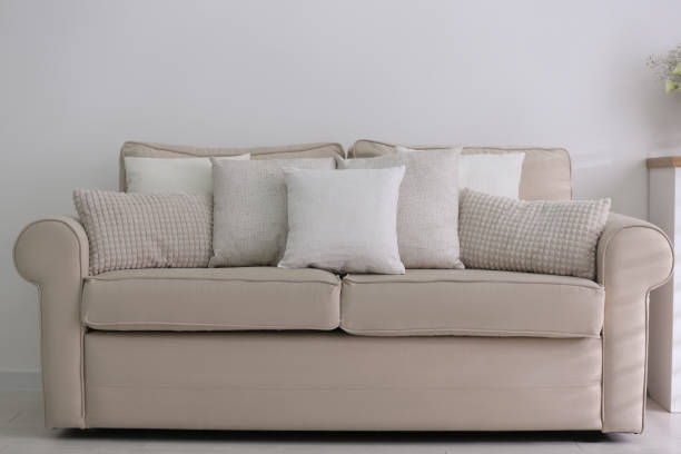 istock Sofa with pillows in modern living room 1379378129