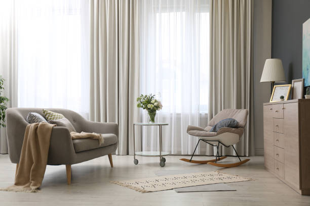 istock Modern living room interior with beautiful curtains on window 1379386392