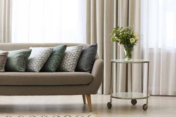 istock Sofa with pillows in modern living room interior 1379390268