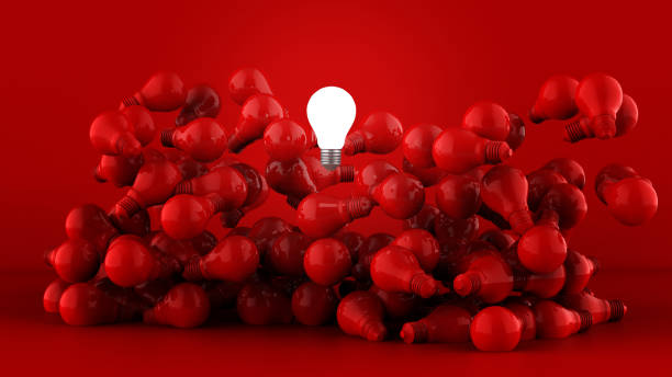 istock Light bulbs on dark red background. Idea concept. 3D Illustration. 1379391859