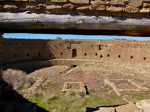 This great Kiva stands on top of a small hill and is partly above ground. Measuring 20 meters in diameter and 4 to 5 meters deep, making it one of the largest known great kivas. Kivas are ceremonial places in Puebloan culture, as well as symbols of the cosmos. At sunrise on the summer solstice, a beam of light from a northeastern opening in the kiva precisely illuminates a niche in the far wall. Chaco Culture National Historical Park is a UNESCO World Heritage Centre in New Mexico.