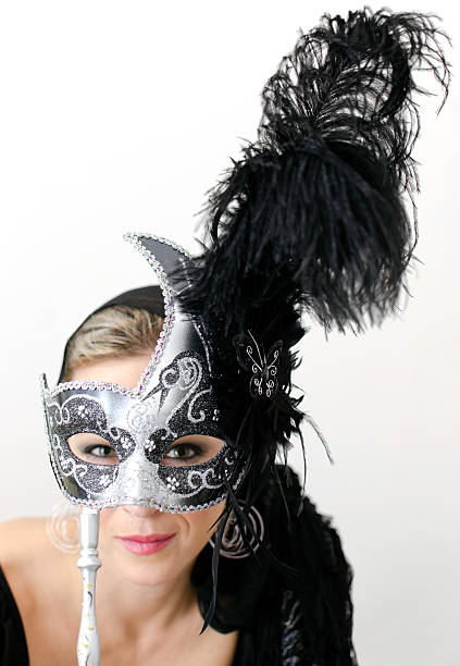 istock Woman in gray and black carnival mask 137940997