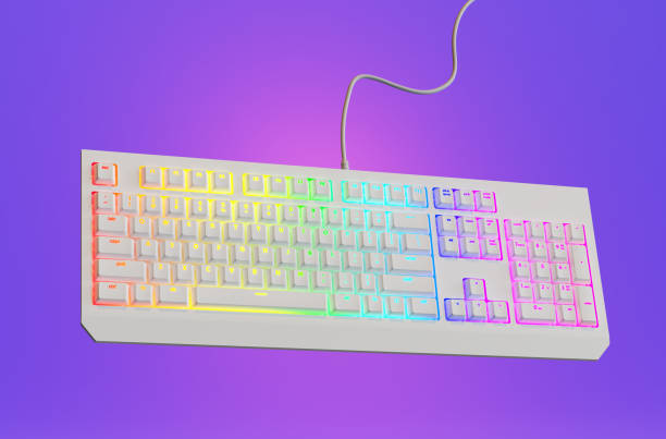 istock Backlit keyboard. White gaming keyboard with RGB light, 3d render. Colorful keyboard on a purple background. 1379412927