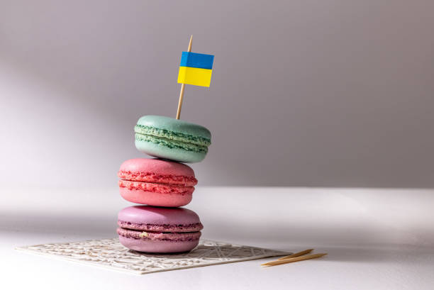 istock Macaroons pile with ukraine flag on white background 1379415190