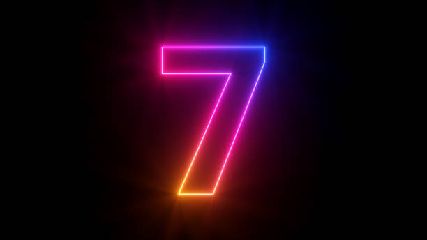 istock 3d render, neon number seven glowing with gradient colors, isolated on black background 1379415757