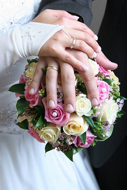 istock Just Married - Hand on a bouquet 137943094