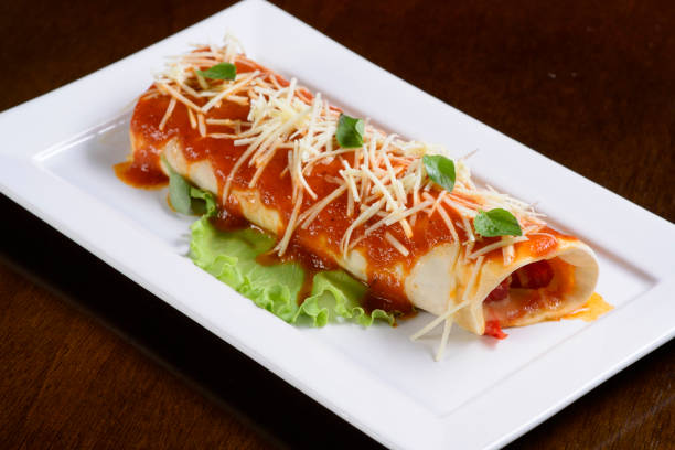 istock Crepe with parmesan and tomato sauce. 1379436527