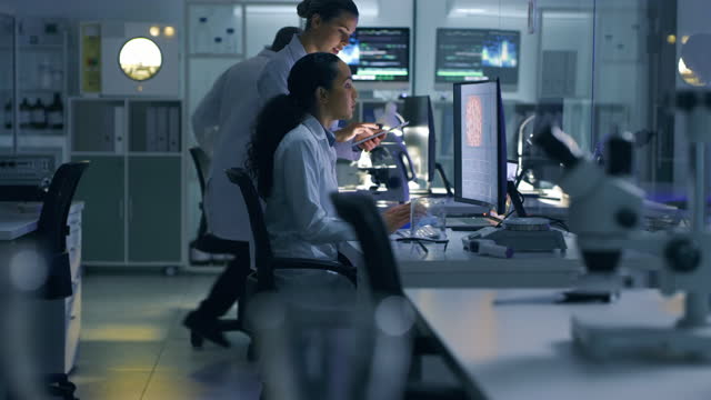 4k video footage of scientists working in a lab
