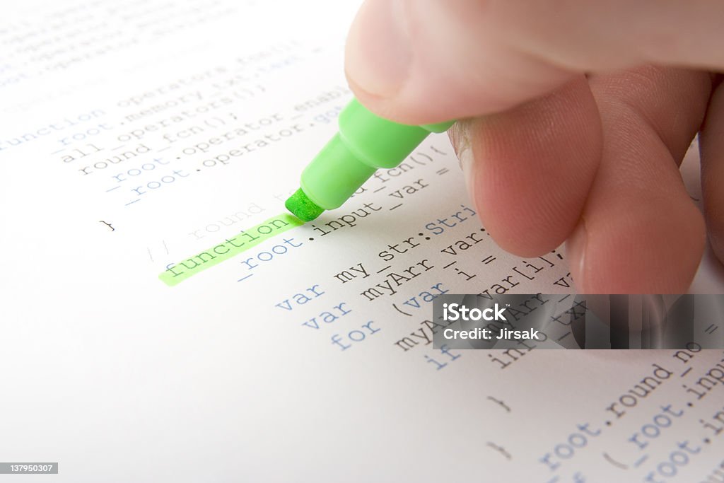 Programmer analyst Programmer analyst check printed code with highlighter Web Design Stock Photo