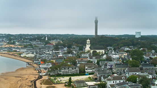 Aerial view of Provincetown, Massachusetts on a foggy overcast morning in Fall.