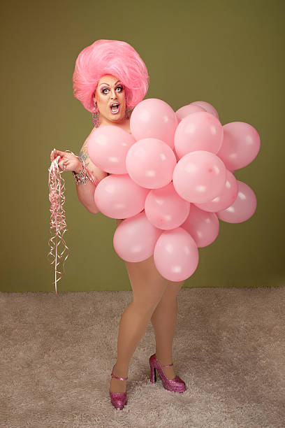 Funny Drag Queen in Pink Balloons stock photo