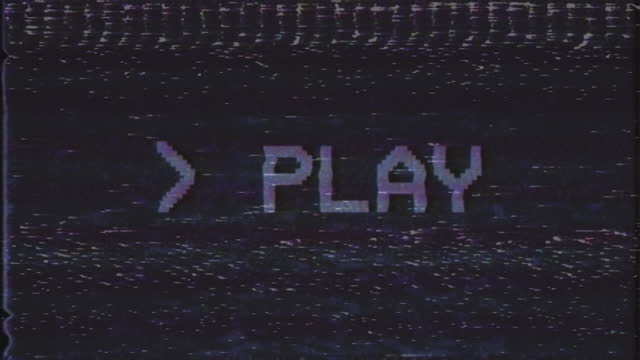 Old damaged VHS tape playing with PLAY text message on screen, retro technology background