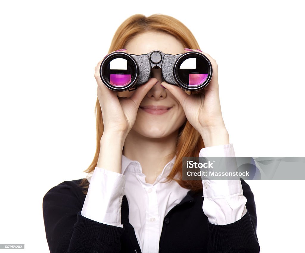 Business women seeking with binocular . Binoculars Stock Photo