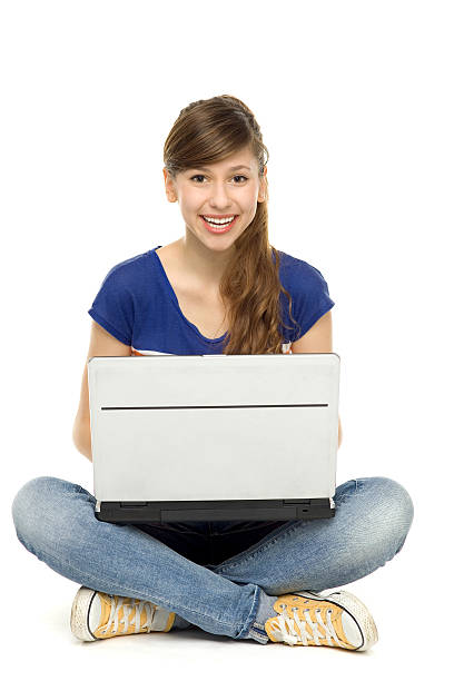 istock Teenage girl using laptop 137956945
