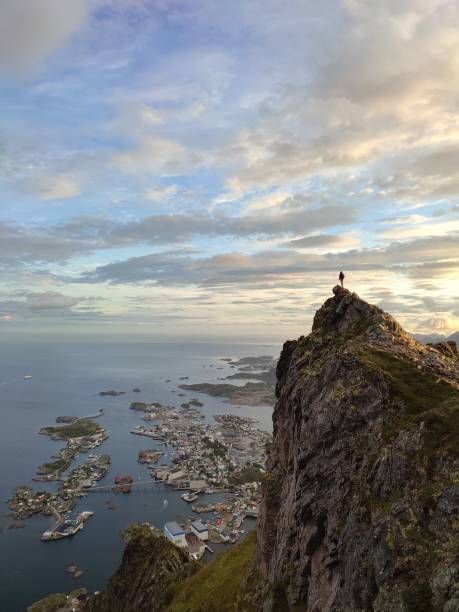 istock One person on top of mountain 1379575778