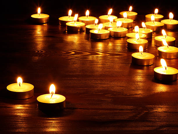 istock Group of  candles on  black background. 137958162