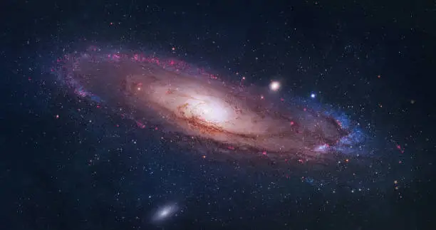 Photo of Bright spiral galaxy with stars in space. Galaxy Andromeda sci-fi high quality space wallpaper. Digital image