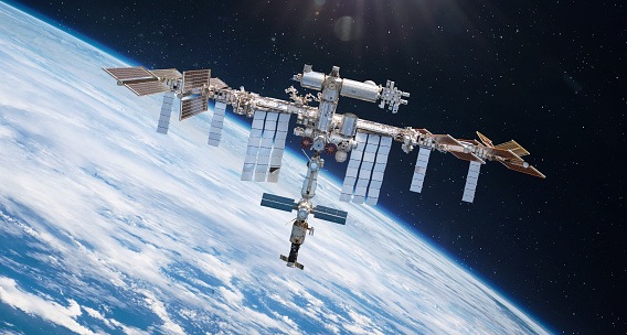 Space station on orbit of Earth. ISS in space near planet surface. Space collage with spaceship. Astronauts in space. Elements of this image furnished by NASA (url: https://www.nasa.gov/sites/default/files/styles/full_width_feature/public/thumbnails/image/iss066e080432.jpg https://www.nasa.gov/sites/default/files/styles/full_width_feature/public/thumbnails/image/iss066e123388.jpg)