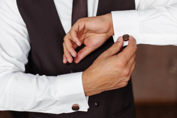 istock The man wears cufflinks. 1379601232