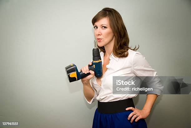 Woman Holding Drill Stock Photo - Download Image Now - Achievement, Adult, Adults Only