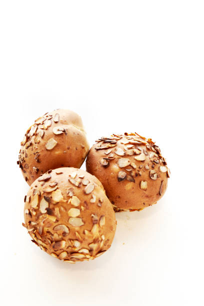 Bread and buns isolated against a white background, traditional bread. Breakfast, bun, on white background photographed from a high angle