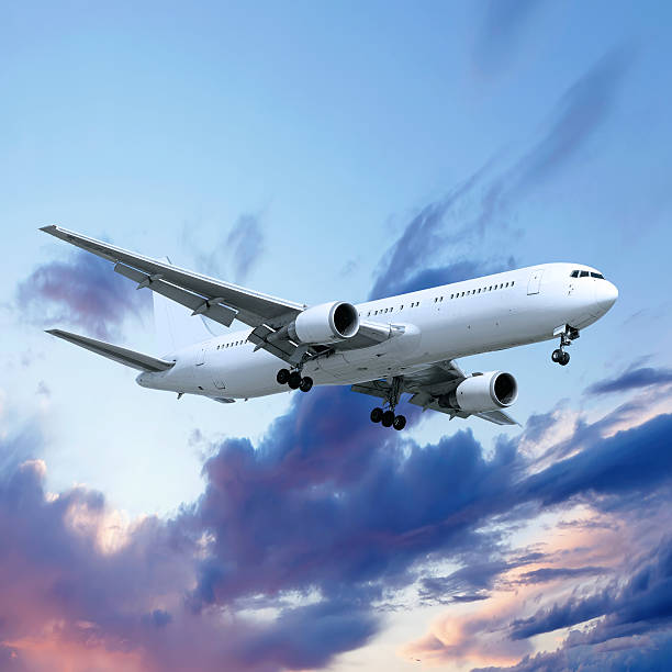 istock XXL jet airplane landing at dusk 137962103