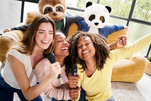 Group Of People Singing In Home Karaoke Women With Animal Mask Bear ...