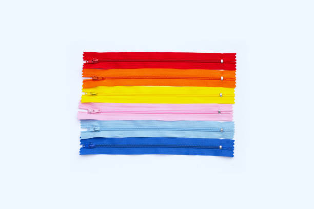 Zipper opens to reveal colorful cloudscape with seagulls flying as symbol for adventure and travel concept