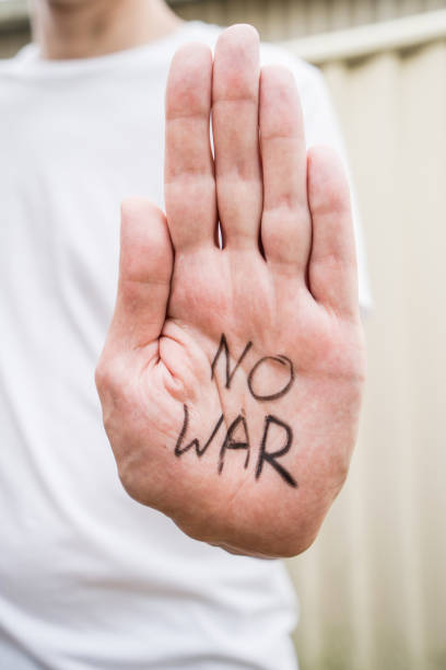 istock No war message written on hand. Russian Ukraine war conflict confrontation protest. Anti war manifestation 1379680797