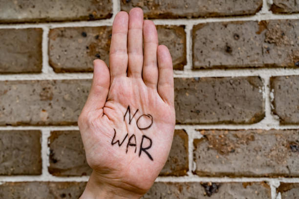 istock No war message written on hand. Russian Ukraine war conflict confrontation protest. Anti war manifestation 1379682889
