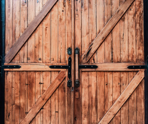 istock ancient gate made of wood and iron as the lock 1379740936