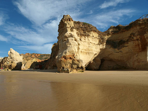 istock Caves and colourful rock formations on the Algarve coast 137988010