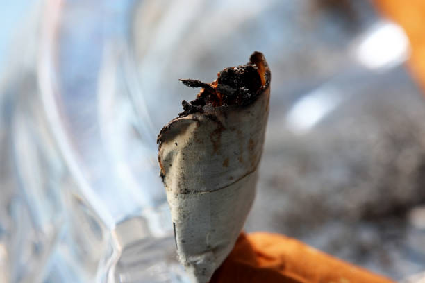 istock close-up cigarette butt in ashtray 1379882306
