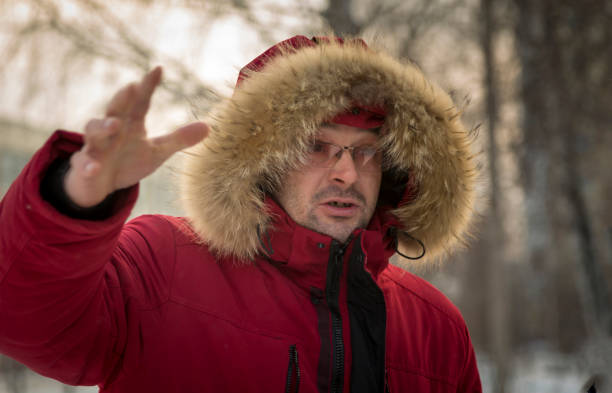 istock Portrait of a worker in a red jacket at a construction site 1379911093