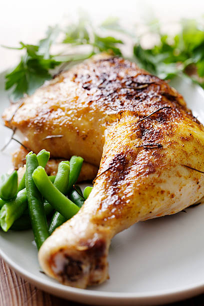 istock A closeup image of roasted chicken with green beans 137991177