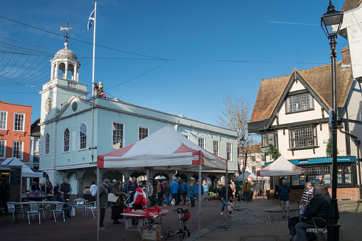 The Town Hall with tourists and shoppers in the medieval market town of  Faversham, Kent, UK