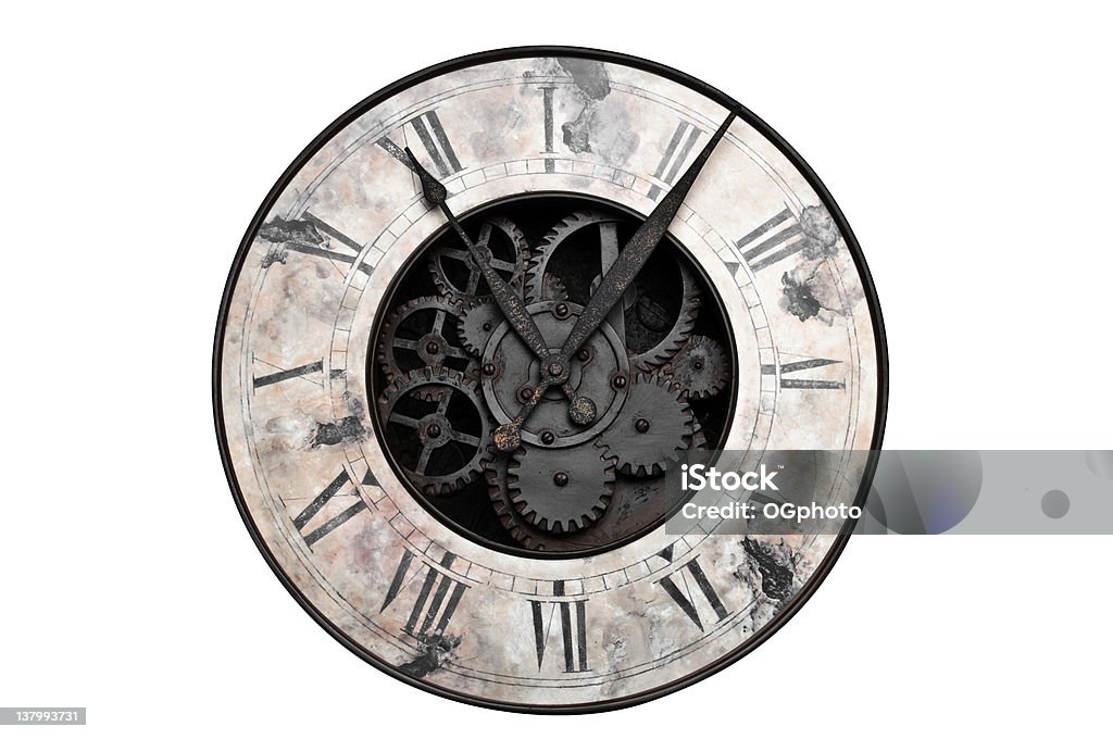 Old fashioned clock with visible center gears A close-up of an old style antique clock. Clock Stock Photo