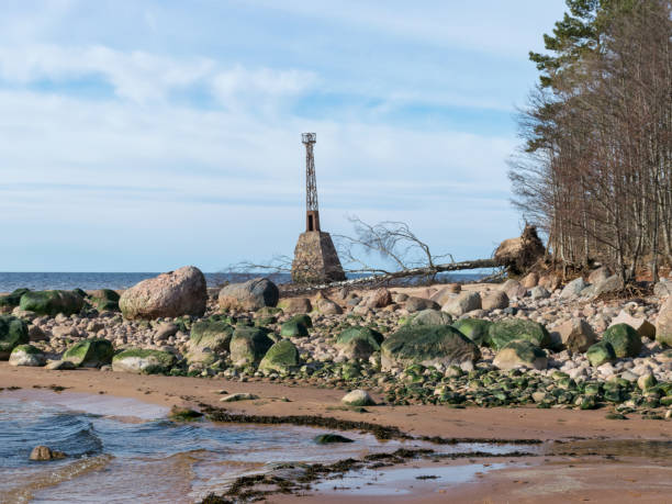 istock Green stones on the coast in the foreground 1379938959
