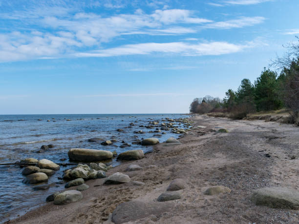 istock blue seascape with many stones on a sunny day 1379945608