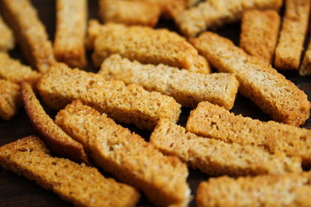 Texture crackers dried crispy brown bread with seasoning Texture crackers dried crispy brown bread with seasoning biscuit quick bread photos stock pictures, royalty-free photos & images