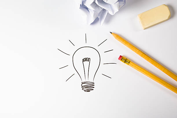 A pencil drawing of a light bulb In search of a good idea product designer photos stock pictures, royalty-free photos & images