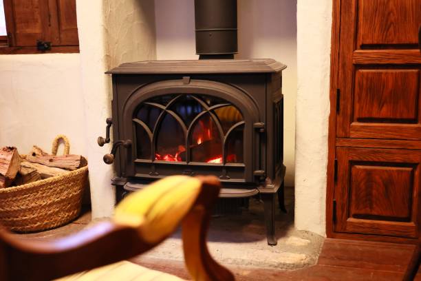 istock Warm wood stove with burning fire 1379962021