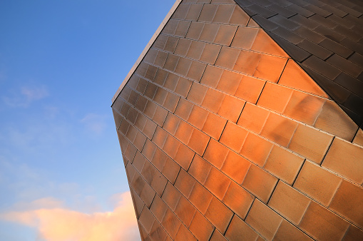 Early morning light reflecting off modern metal architecture. Salford Quays, Manchester. 