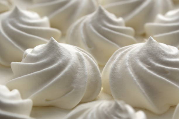 istock Festive curls for white meringue cream cake 1379976815