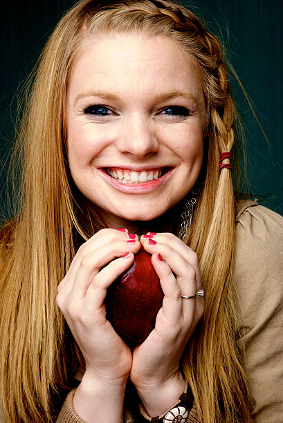 Beautiful Woman with red apple