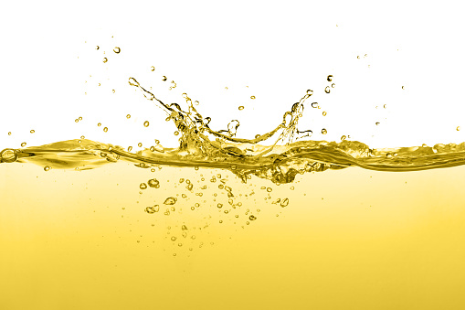 Cooking oil with air bubble splash isolated on white background.